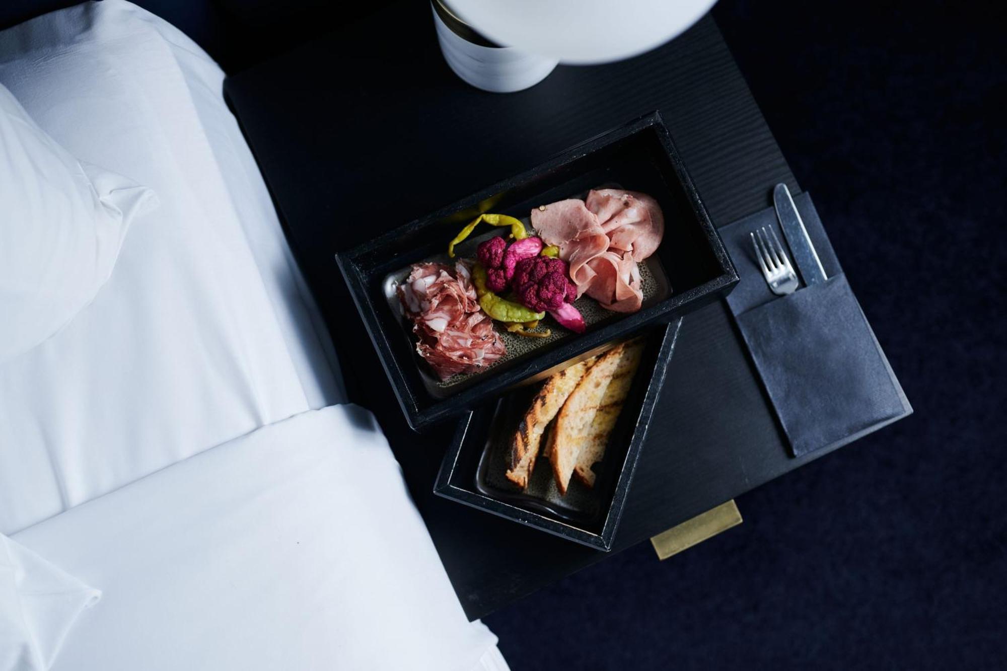 Midnight Hotel, Autograph Collection Canberra Exteriör bild A first-class meal on board a Lufthansa plane