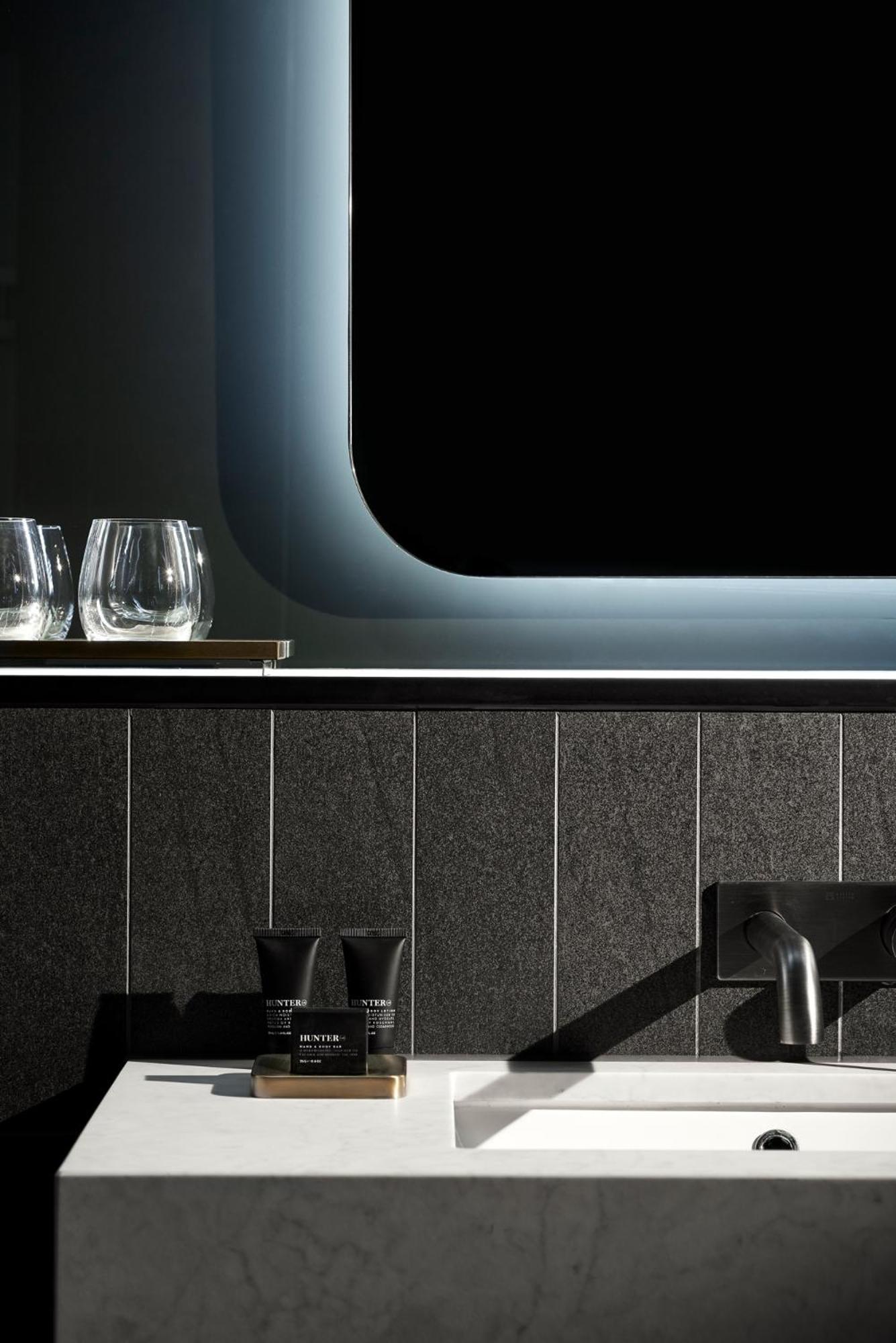 Midnight Hotel, Autograph Collection Canberra Exteriör bild A kitchen with a black granite countertop